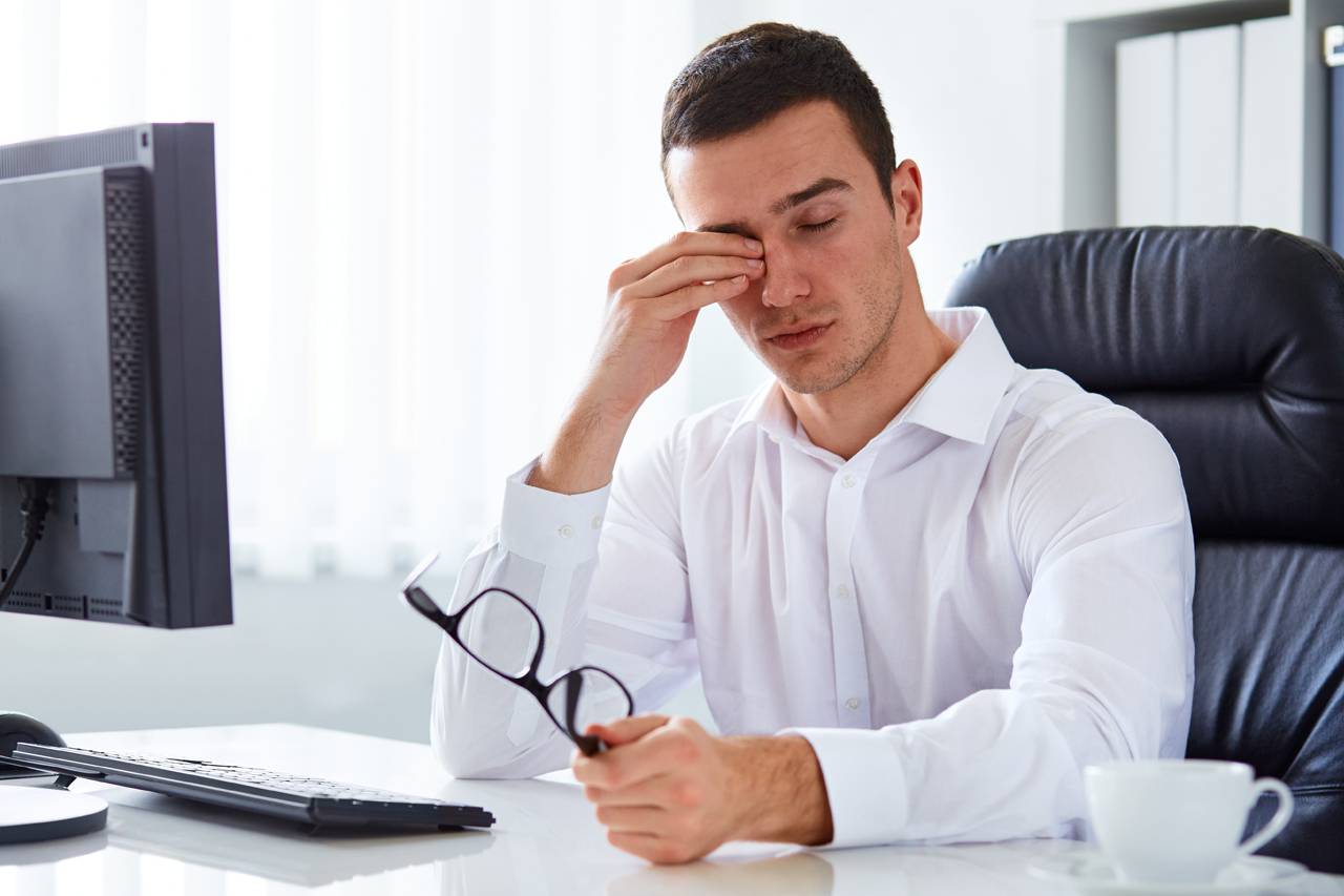 man rubbing eyes 1280×853